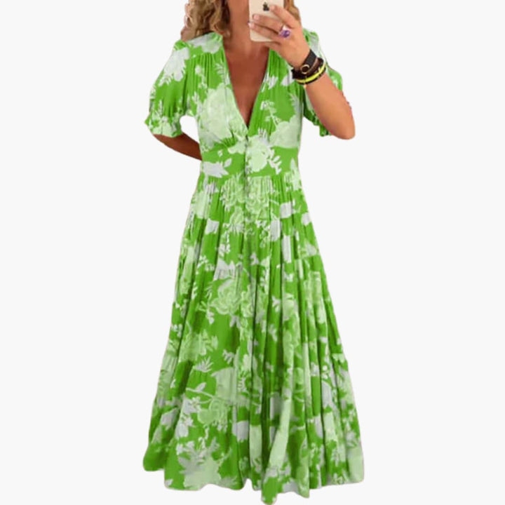 Women’s Maxi Dress with Deep V-Neckline and Pleated Skirt