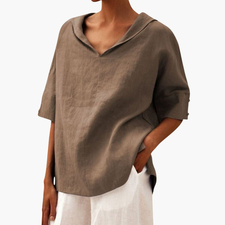 Women’s short sleeve blouse with V-neck and rolled sleeves