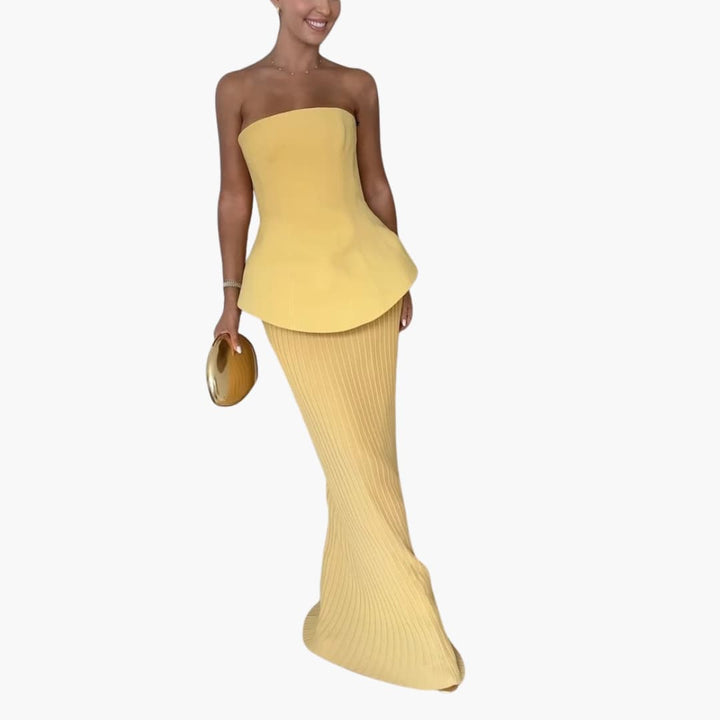 Women’s strapless maxi dress with peplum bodice and pleated skirt