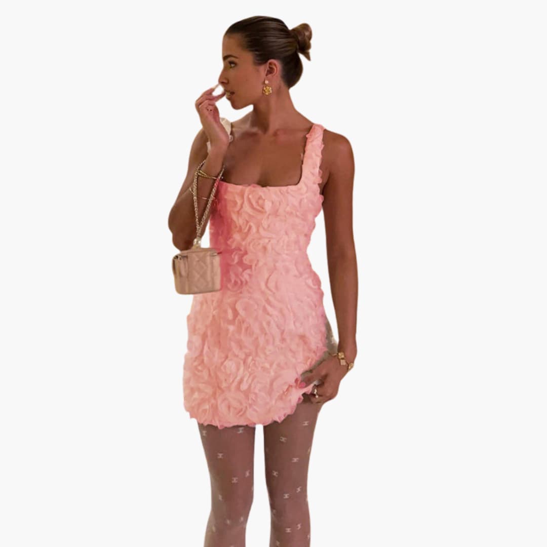 Women’s mini dress with sleeveless design and floral appliqué