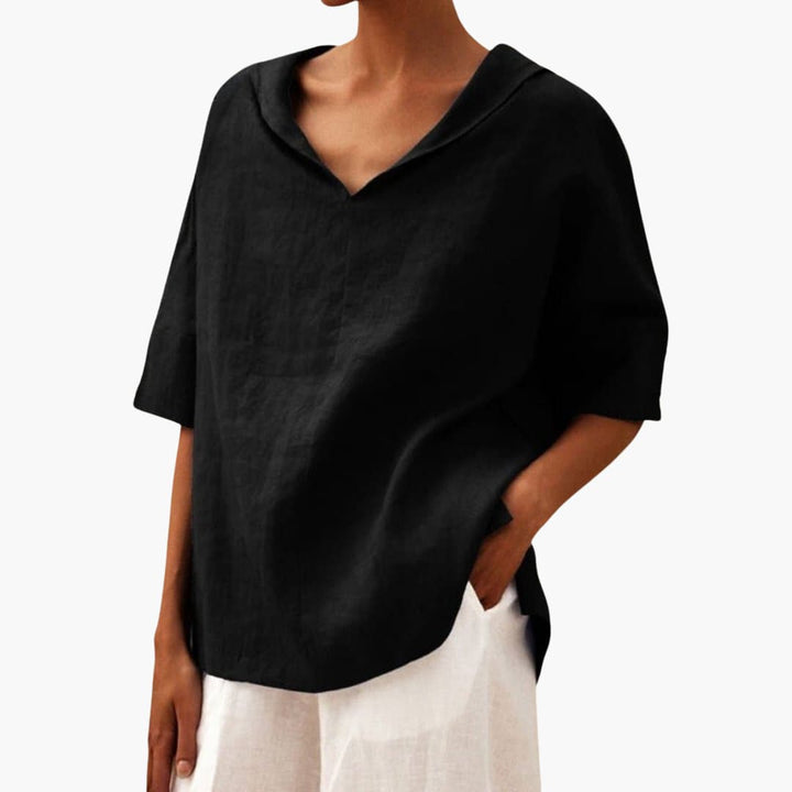 Women’s short sleeve blouse with V-neck and rolled sleeves